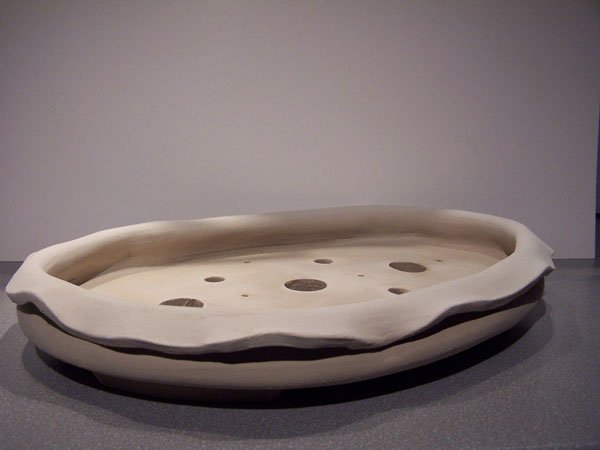 Oval: 42 X 30 X 7 cm
