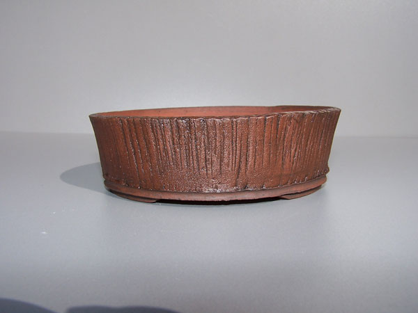 Schale rund/glasiert und gebeitzt.
<br />Durchmesser:13cm, höhe:4cm